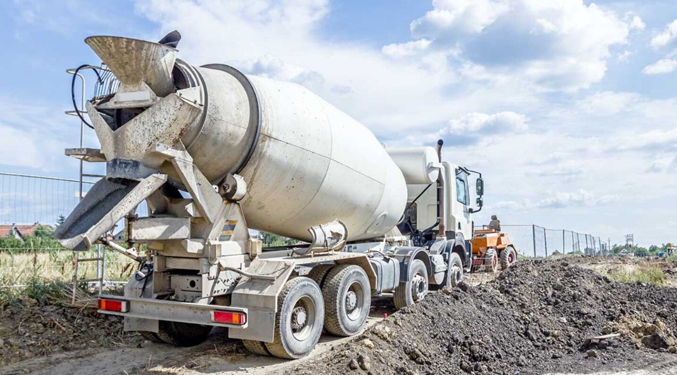 Cement mixer truck at concrete construction site in Chicopee, MA